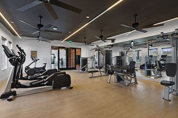 Fitness Center With Modern Equipment at Terraces at High Mountain, Alabama